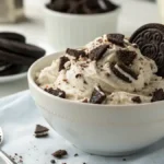 A creamy bowl of Oreo Fluff with crushed Oreo cookies on top, ready to be served.